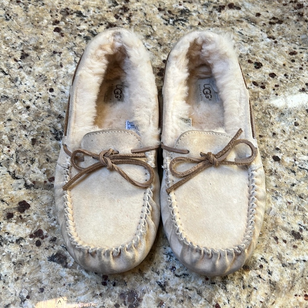 WMNs UGG moccasin with rubber solos sz 10 cream color worn very little